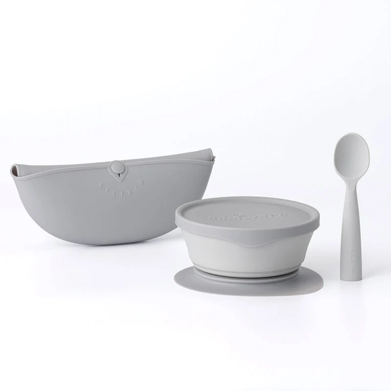 Miniware First Bite Deluxe Set - Silicone Bib + Cereal Bowl + Silicone Lid + Training Spoon + Detachable Suction Foot in Grey