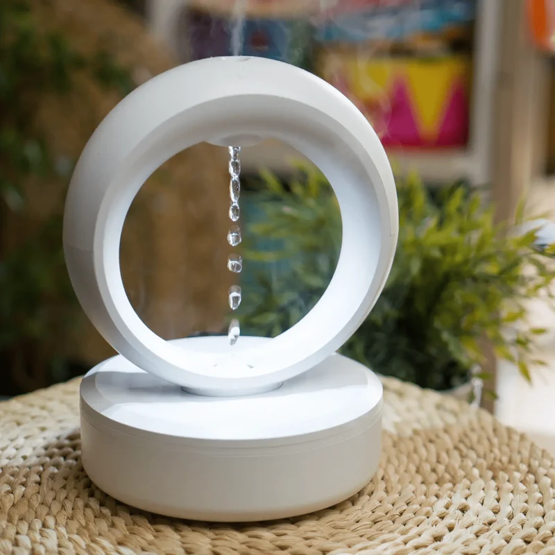 Svävande vattendroppe ultrasonisk luftfuktare med LED-belysning